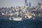 In Istanbul, ferries operate on the Bosphorus line. Traditional old steamers. Cloud weather in the background and the Anatolian