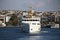 In Istanbul, ferries operate on the Bosphorus line. Traditional old steamers. Cloud weather in the background and the Anatolian