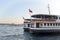 Istanbul, ferry in Karakoy pier. Hagia Sophia museum in the back