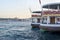 Istanbul, ferry in Karakoy pier. Hagia Sophia museum in the back