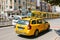 Istanbul, June 11, 2017: A traditional yellow taxi rides on the street in the Fatih district of Istanbul, Turkey. Urban