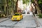 Istanbul, June 15, 2017: A traditional yellow taxi rides on the street. Urban life style. Transportation of passengers.