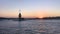 Istanbul Maiden Tower kiz kulesi at sunset on the entrance to Bosporus Strait in Istanbul, Turkey.