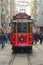 ISTANBUL - NOV, 21: A red classic tram in the crowded Istiklal A