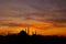 Istanbul silhouette. suleymaniye Mosque at sunset with dramatic clouds.