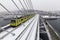 Istanbul subway metro train passing and people walking on the Golden Horn Metro Bridge