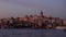 Istanbul, Turkey, 02/03/2020 - Sunset during magical hour at Galata tower, Galata Bridge and Golden Horn. The Golden Horn is a maj
