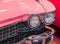 Istanbul, Turkey, 23 March 2019: Close-up photo of pink Cadillac de Ville. Detail on the headlight of vintage classic