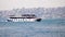 Istanbul, Turkey - April 21, 2023: passenger ferry sails across the Bosphorus strait in Istanbul, Turkey
