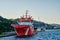 Istanbul, Turkey, July 14, 2021, a red fire ship on the Bosphorus stands on the pier