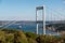 ISTANBUL, TURKEY - OCTOBER 12 ,2021: Panoramic view of Istanbul Bosphorus. Istanbul Fatih Sultan Mehmet Bridge. cloudy blue sky