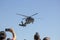 Istanbul, Turkey - September-22,2019: Sikorsky helicopter engaged in demonstration flight in the air. People watching and