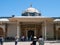 Istanbul / Turkey Tourists taking photos, visitors at Topkapi palace inner yard, impressive dome and entrance