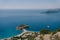 Isthmus of the island of Sveti Stefan with a beach. Montenegro