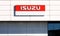 Isuzu logo on a facade of the dealer of the area. It is a japanese manufacturing company of commercial vehicles and diesel engine