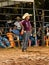 Itaja, Goias, Brazil - 04 21 2023: woman standing in a rodeo arena at a bull riding