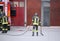 Italia, Italy - May 10, 2018: Italian firefighters with fire truck during a practical exercise