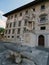 Italia. Pisa. Piazza dei Cavalieri. The Palazzo della Carovana and the statue of Cosimo I