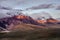 Italian Abruzzo Mountains Monte Camicia and Monte Prena covered by clouds at the evening with last sum beams