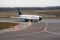 Italian airlines Blue Panorama airplane Boeing on runway in Vilnius international airport. Aviation, charter flights