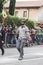 Italian alpine military parade: the man carries the italian flag