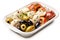Italian Antipasti Set with Small Peppers Stuffed with Cream Cheese, Pickled Olives, Marinated Mushrooms