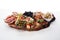 Italian antipasti wine snacks set. Cheese variety, Mediterranean olives, pickles, Prosciutto di Parma, tomatoes, artichokes