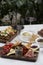 Italian antipasti wine snacks on table, outdoor party