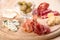 Italian antipasto with ham, olive, cheese