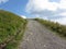 Italian Apennine mountains landscape with upward hiking trail towards the sky . San Pellegrino in Alpe, Tuscany, Italy