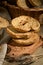 Italian appetizer Friselle. Apulian dried bread Friselle in wooden background