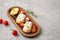 Italian appetizer toasted bread bruschetta with cream chease and tomatoes