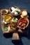 Italian appetizers - various bruschettas, vertical top view