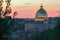 Italian architectural masterpiece during pink sunset in Rome