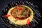 Italian Beef Osso Buco dish with mashed potatoes and vegetables on black plate on wooden background