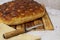 Italian bread with cheese, tomatoes and herbs. Focaccia on the table