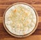 Italian bread focaccia over wooden background