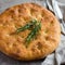 Italian bread focaccia with sea salt and rosemary