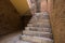 Italian brick stairway and handrail with brickwall