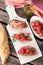Italian bruschettas with ham prosciutto, coppa and salami