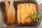 Italian cannelloni pasta on a light table. Flat lay a caneloni pasta dinner close-up and copy space