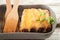 Italian cannelloni pasta on a light table. Flat lay a caneloni pasta dinner close-up and copy space