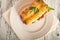 Italian cannelloni pasta on a light table. Flat lay a caneloni pasta dinner close-up and copy space