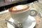 Really italian Cappuccino coffe in a bar of Italy with drown heart