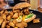 Italian ciabata bread served with fresh salade and vegan fried chicken in pieces