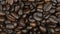 Italian coffee, organic food. Close-up of seeds of coffee. Fragrant coffee beans are roasted. Macro shot