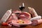 Italian cold cuts on brown background
