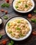 Italian conchiglie prawn, shrimp pasta in a creamy sauce on plate.