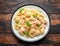 Italian conchiglie prawn, shrimp pasta in a creamy sauce on plate.