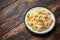 Italian conchiglie prawn, shrimp pasta in a creamy sauce on plate.